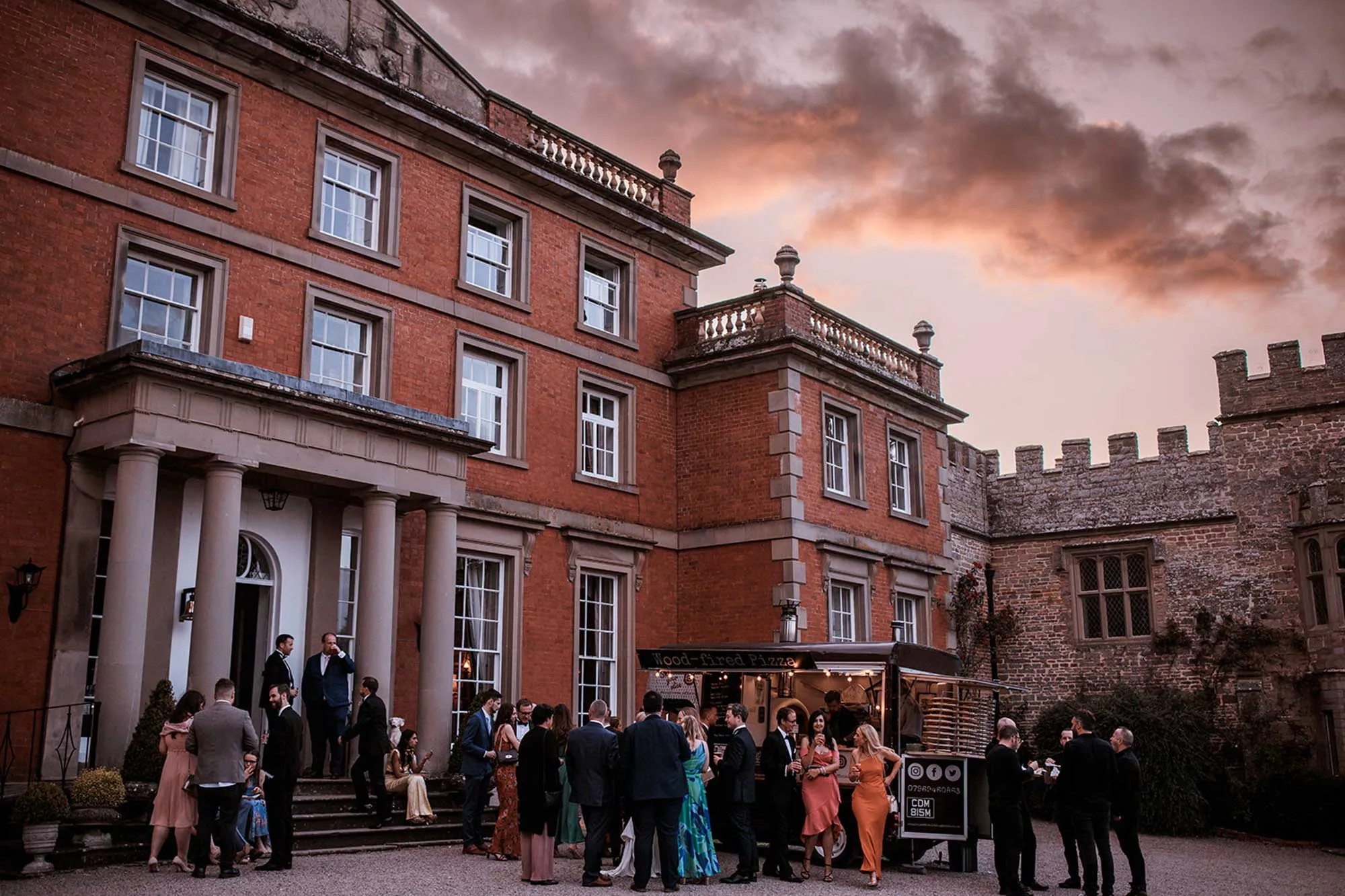 Wedding-guests-and-pizza-van-outside-Homme-House-in-the-evening