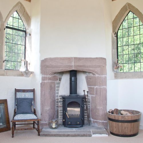 The wood burner in the Upper Chamber at Homme House