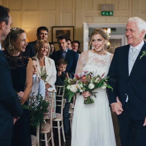 Bride entering Panelled Room for wedding ceremony