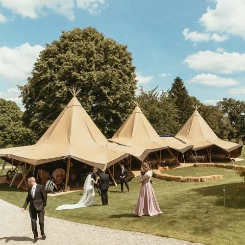 Connected tipis on the main lawn at Homme House