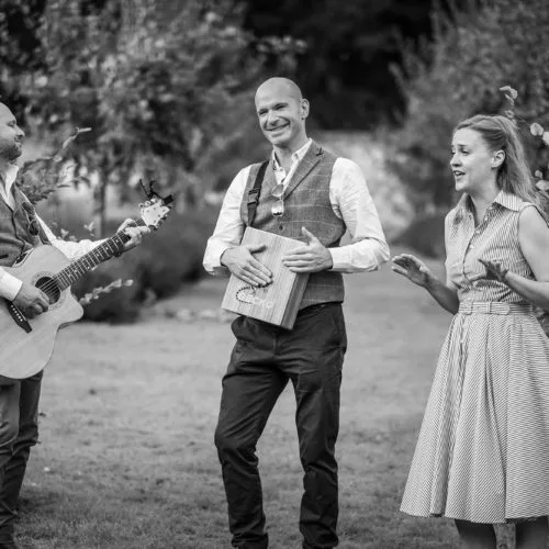 Acoustic-band-play-in-Homme-House-walled-garden