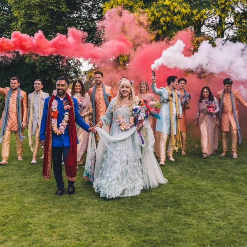 Bridal-party-group-photo-with-smoke-bombs-on-the-lawn-at-Homme-House