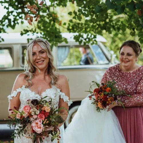 Bride-and-bridesmaid-beside-campervan