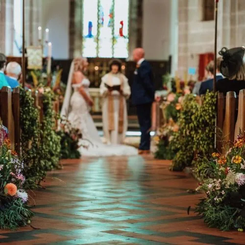 Bride-and-groom-exchange-vows-in-church