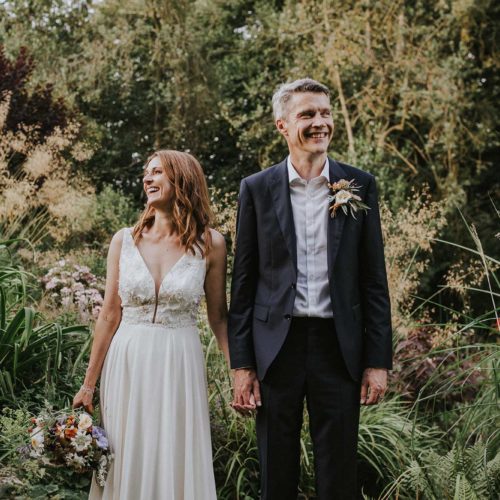 Bride-and-groom-portrait-beside-Homme-House-water-feature