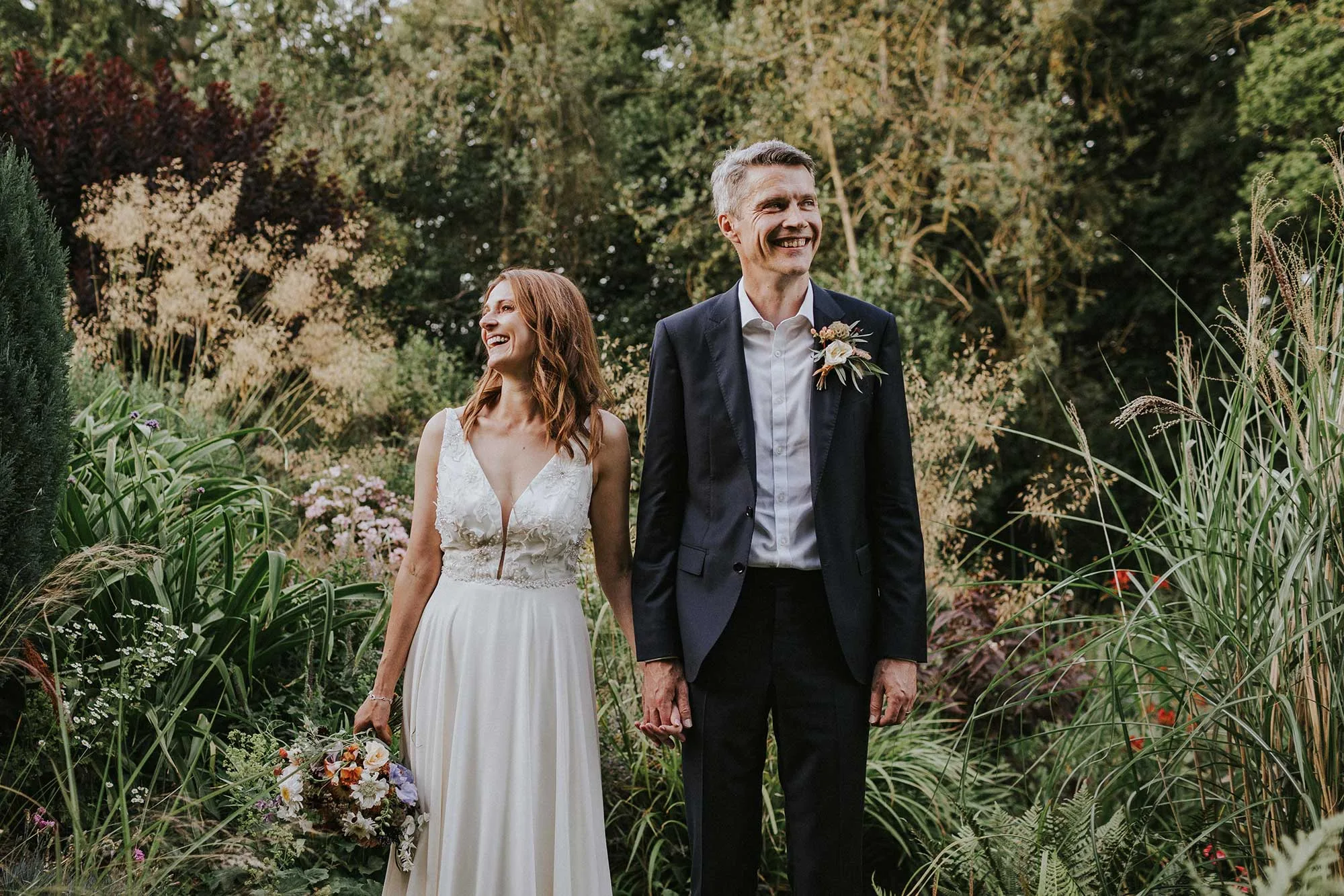 Bride-and-groom-portrait-beside-Homme-House-water-feature