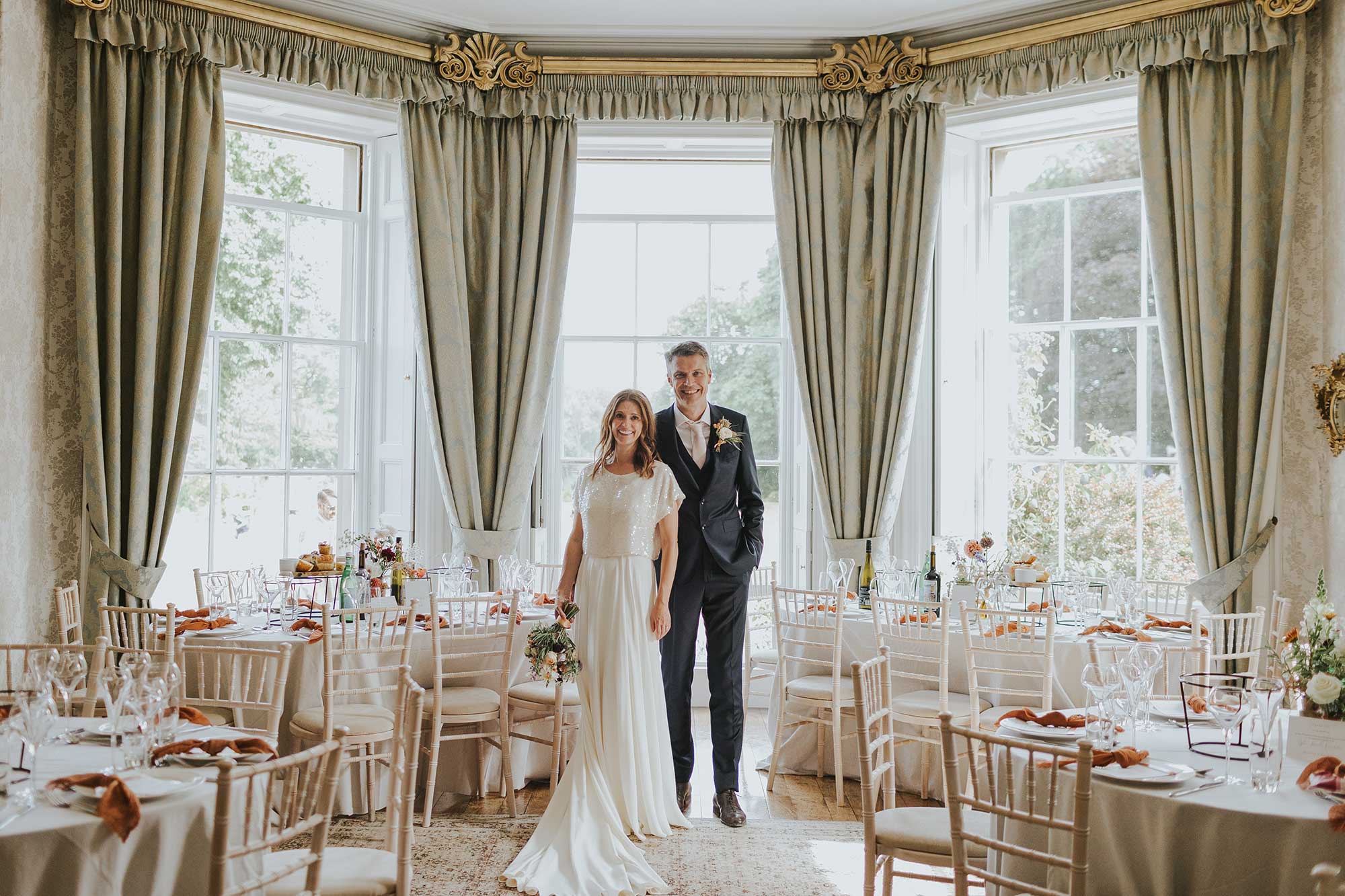 Bride-and-groom-portrait-in-Homme-House-Dining-Room-bay-window