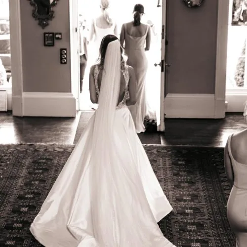 Bride-leaves-Homme-House-Hall-for-wedding-ceremony