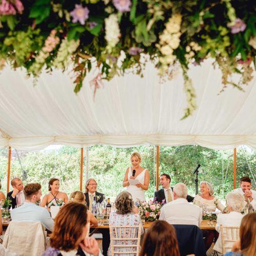 Bride-wedding-speech-in-marquee-at-Homme-House