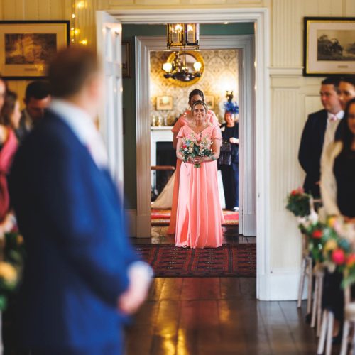 Bridesmaids-enter-Panelled-Room-ceremony-at-Homme-House