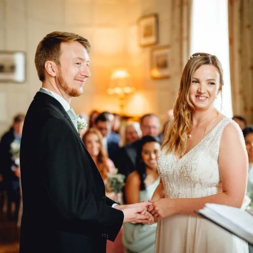 Couple-exchange-vows-in-Homme-House-wedding-ceremony