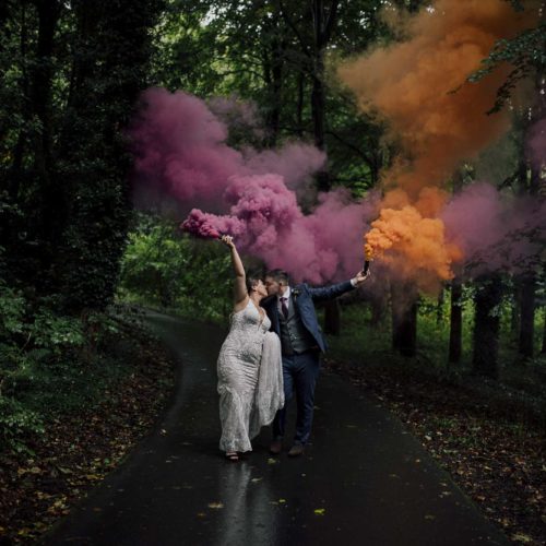 Couple-smoke-bomb-portrait-in-woodland