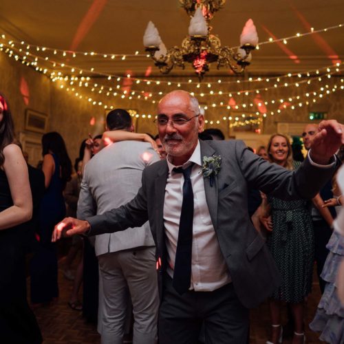 Father-of-bride-dancing-at-Homme-House-wedding