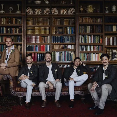 Groom-and-groomsmen-in-Homme-House-Library