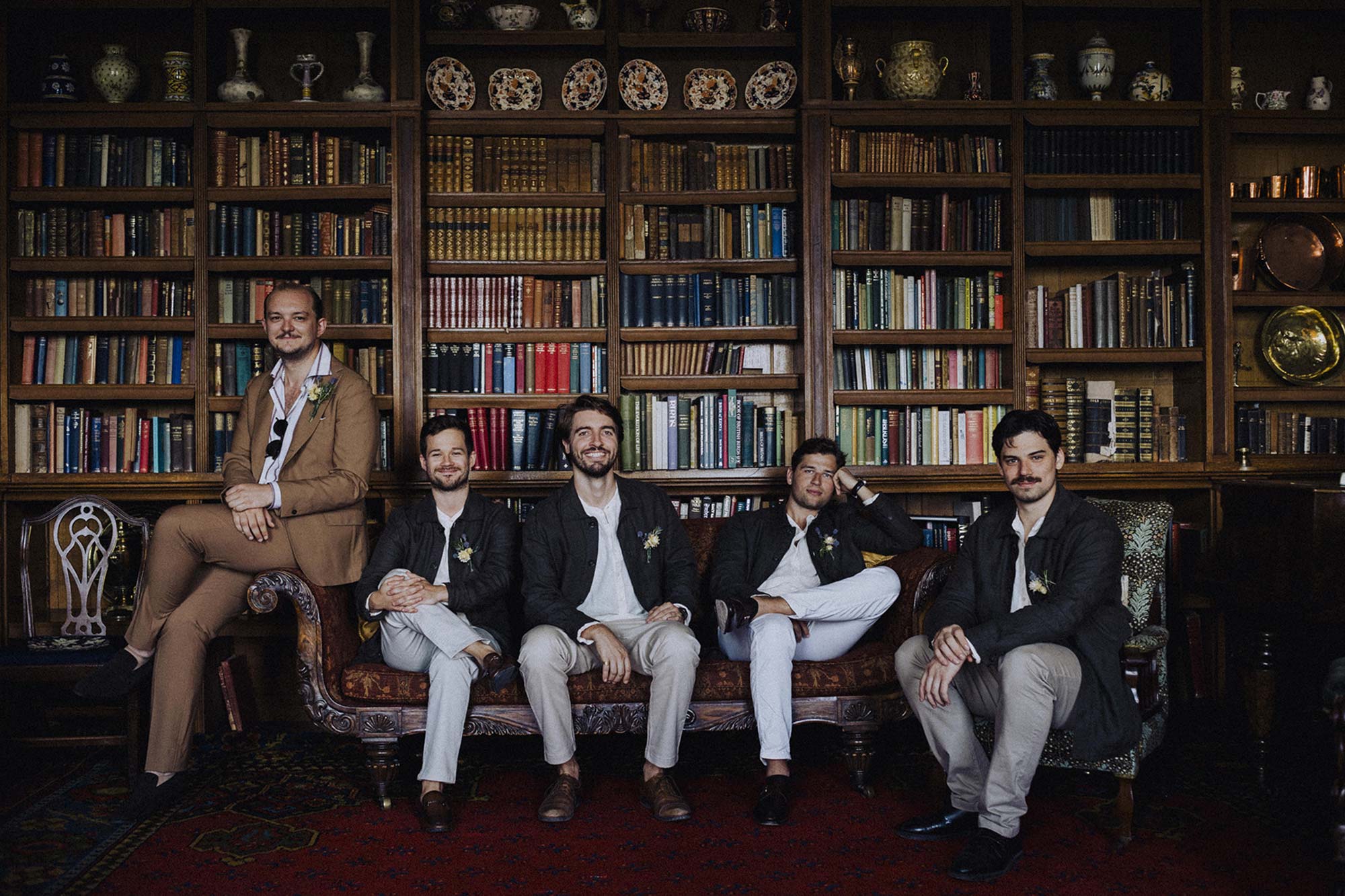 Groom-and-groomsmen-in-Homme-House-Library