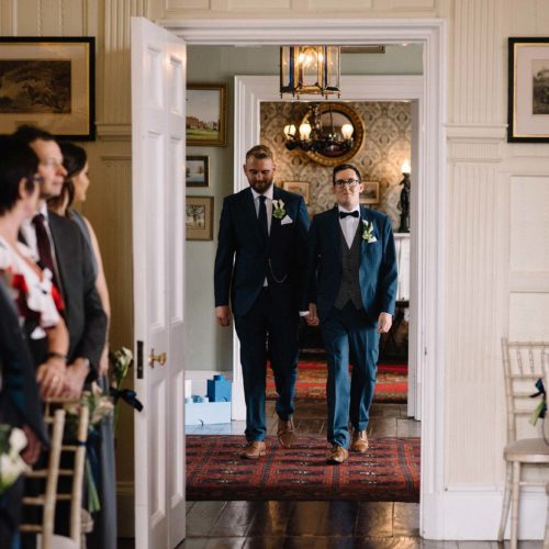 Grooms-enter-Homme-House-wedding-ceremony
