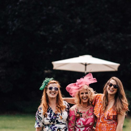 Guests-in-colourful-outfits-at-wedding-reception