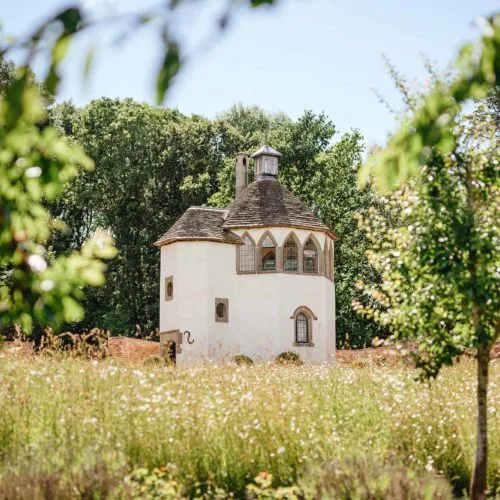 Homme-House-Summerhouse-and-wild-flower-meadow