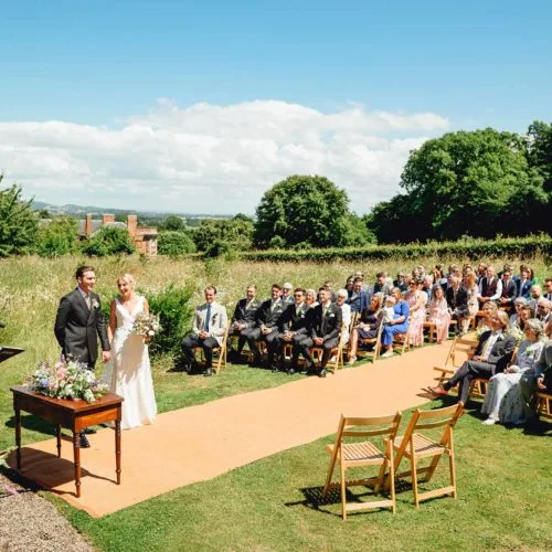 Homme-House-walled-garden-wedding-ceremony