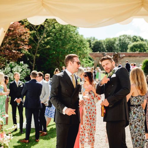 Homme-House-wedding-drinks-reception-outside-marquee