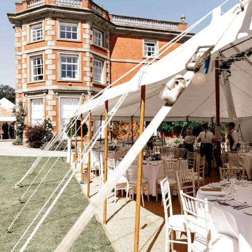 Marquee-set-up-on-lawn-at-Homme-House