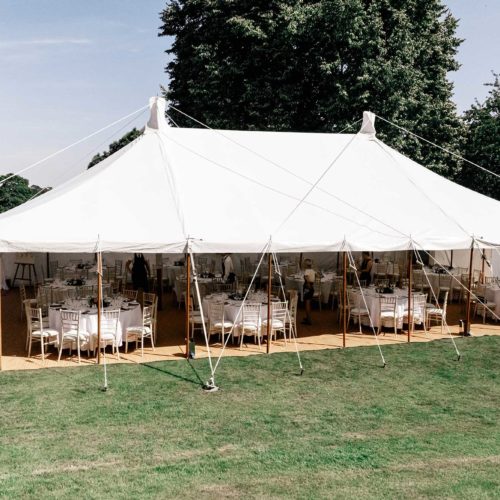 Marquee-set-up-on-lawn-at-Homme-House-from-side