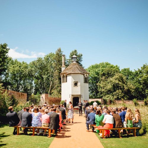 Outdoor-wedding-ceremony-at-Homme-House-in-front-of-the-Summerhouse