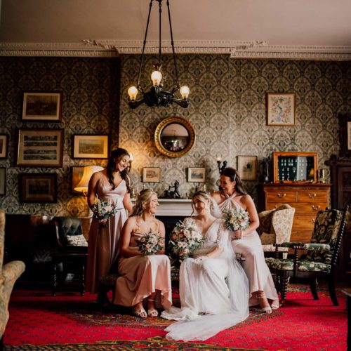 Bride-and-bridesmaids-in-Library-at-Homme-House
