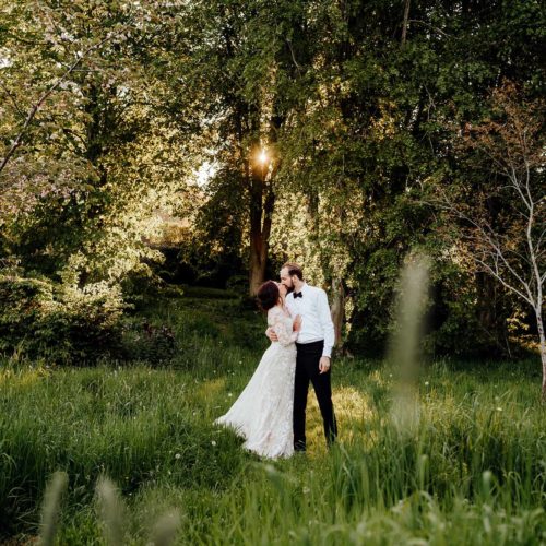 Bride-and-groom-in-orchard-at-Homme-House