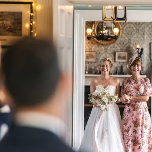 Bride-and-mother-enter-Homme-House-wedding-ceremony