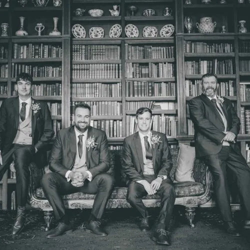 Groom-and-other-men-in-Library-at-Homme-House