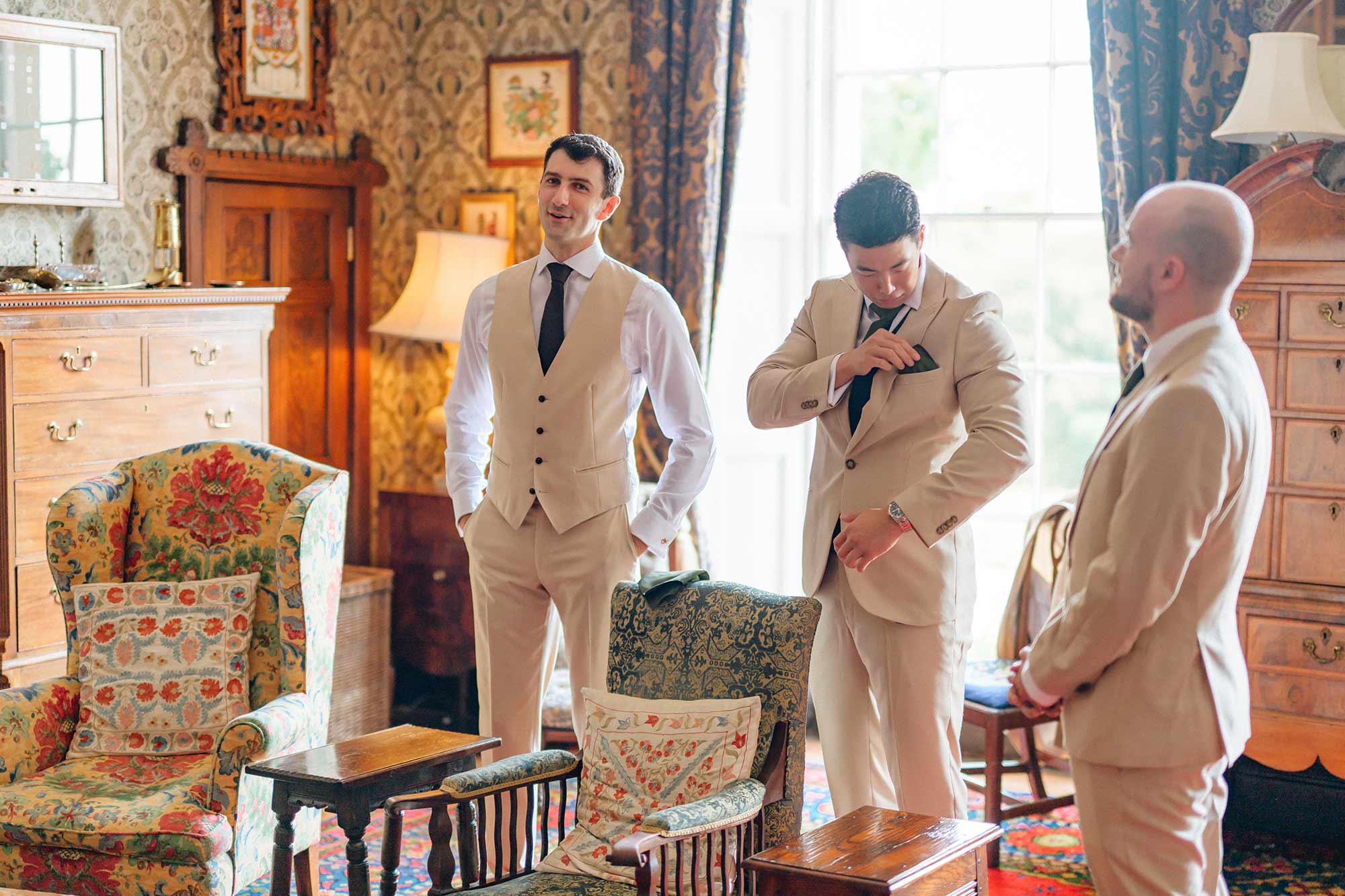 Groom-and-groomsmen-in-the-Library-at-Homme-House